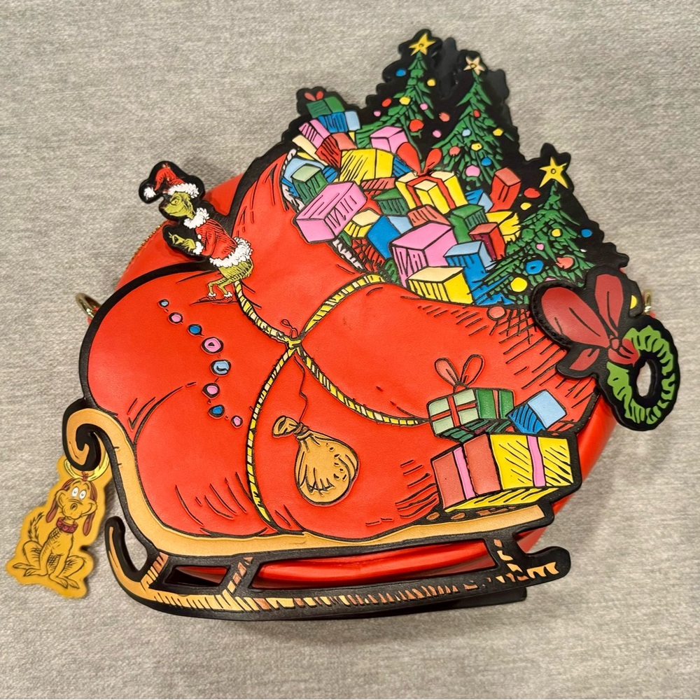 The grinch sled loungefly bag